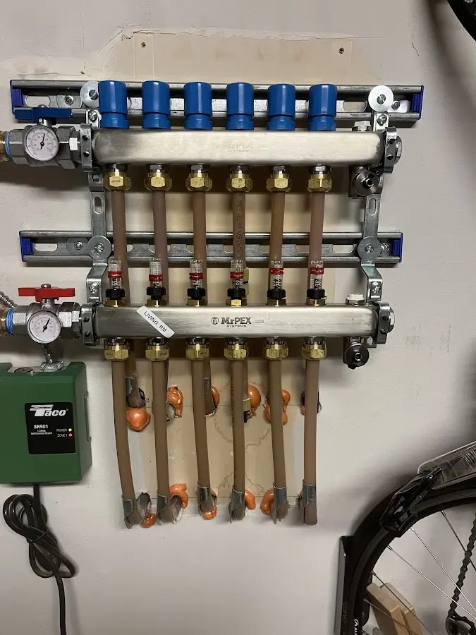 Plumber performing Gas Line Installation at a residential property in Lee